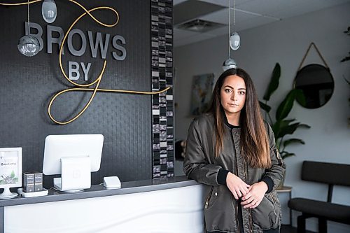 MIKAELA MACKENZIE / WINNIPEG FREE PRESS

Giovanna Minenna poses in her Grant Park location of Brows by G, which she has chosen to close because of COVID-19 concerns, in Winnipeg on Tuesday, March 17, 2020.
Winnipeg Free Press 2020