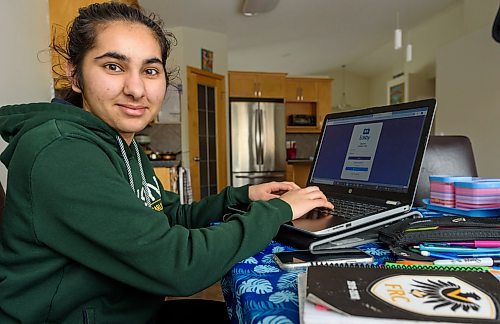 JESSE BOILY / WINNIPEG FREE PRESS
Divya Sharma, a grade 10 Fort Richmond Collegiate student, updates her Edbsy portfolio to inform her teachers of her progress to the online classes at her home on Tuesday, March 17, 2020. The app is available on her phone and her computer. 
Reporter: Maggie Macintosh