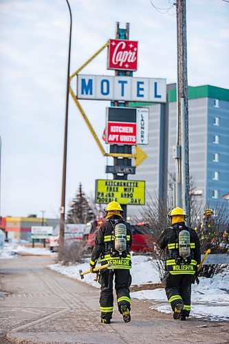 MIKAELA MACKENZIE / WINNIPEG FREE PRESS

Firefighters on the scene of a fire at the Capri Motel in Winnipeg on Wednesday, March 18, 2020.
Winnipeg Free Press 2020