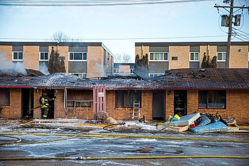 MIKAELA MACKENZIE / WINNIPEG FREE PRESS

Firefighters on the scene of a fire at the Capri Motel in Winnipeg on Wednesday, March 18, 2020.
Winnipeg Free Press 2020