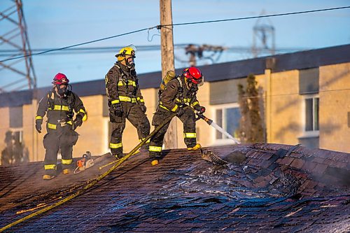 MIKAELA MACKENZIE / WINNIPEG FREE PRESS

Firefighters on the scene of a fire at the Capri Motel in Winnipeg on Wednesday, March 18, 2020.
Winnipeg Free Press 2020