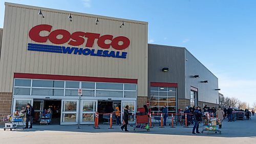 JESSE BOILY / WINNIPEG FREE PRESS
Shoppers line up outside the McGillivray Costco on Wednesday, March 18, 2020 in Winnipeg. 
Reporter: