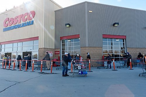 JESSE BOILY / WINNIPEG FREE PRESS
Shoppers line up outside the McGillivray Costco on Wednesday, March 18, 2020 in Winnipeg. 
Reporter: