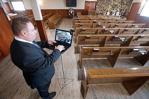 JOHN WOODS / WINNIPEG FREE PRESS
Michael Vogiatzakis, general manager of Voyage Funeral Home, is setting up live streaming in his funeral home in Winnipeg Wednesday, March 18, 2020. Funeral homes are changing their practices in this time of social isolation.

Reporter: Suderman