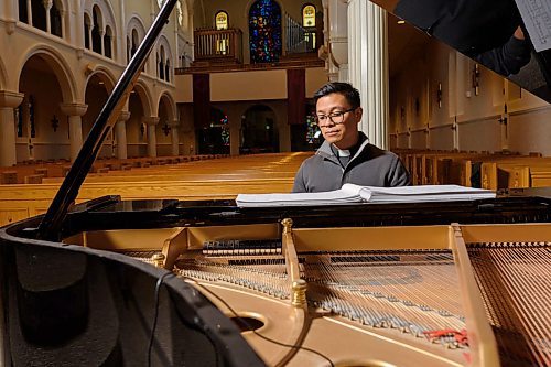 JESSE BOILY / WINNIPEG FREE PRESS
Rev. Geoffrey Angeles sits at the piano to an empty church on Thursday, March 19, 2020. Angeles plans to livestream his Sunday sermon.
Reporter: Brenda Suderman