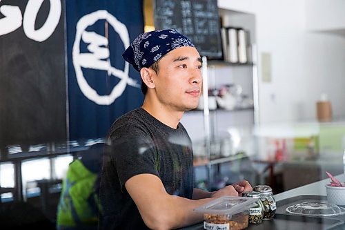 MIKAELA MACKENZIE / WINNIPEG FREE PRESS

Zhehong Wen, who just opened Poke Mono last week, poses for a portrait in his restaurant in downtown Winnipeg on Thursday, March 19, 2020. For Ben Waldman story.
Winnipeg Free Press 2020