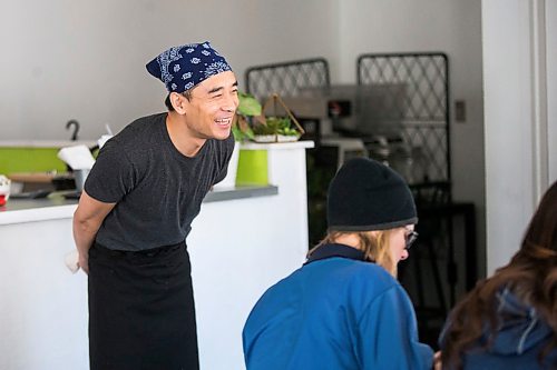 MIKAELA MACKENZIE / WINNIPEG FREE PRESS

Zhehong Wen, who just opened Poke Mono last week, speaks to a group of postal workers in for lunch in his restaurant in downtown Winnipeg on Thursday, March 19, 2020. For Ben Waldman story.
Winnipeg Free Press 2020