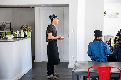 MIKAELA MACKENZIE / WINNIPEG FREE PRESS

Zhehong Wen, who just opened Poke Mono last week, speaks to a group of postal workers in for lunch in his restaurant in downtown Winnipeg on Thursday, March 19, 2020. For Ben Waldman story.
Winnipeg Free Press 2020