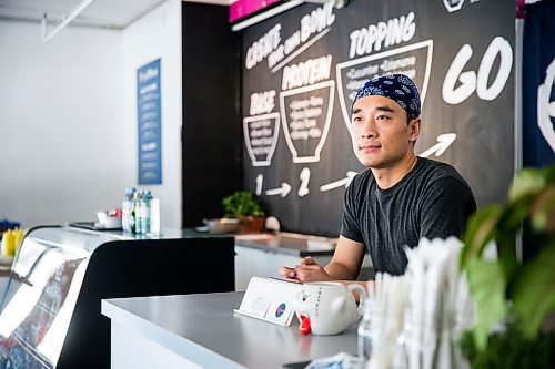 MIKAELA MACKENZIE / WINNIPEG FREE PRESS

Zhehong Wen, who just opened Poke Mono last week, poses for a portrait in his restaurant in downtown Winnipeg on Thursday, March 19, 2020. For Ben Waldman story.
Winnipeg Free Press 2020