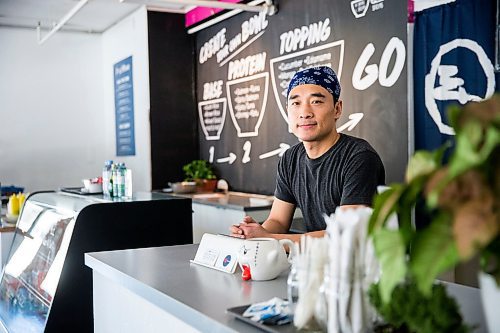 MIKAELA MACKENZIE / WINNIPEG FREE PRESS

Zhehong Wen, who just opened Poke Mono last week, poses for a portrait in his restaurant in downtown Winnipeg on Thursday, March 19, 2020. For Ben Waldman story.
Winnipeg Free Press 2020