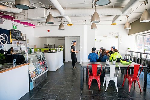 MIKAELA MACKENZIE / WINNIPEG FREE PRESS

Zhehong Wen, who just opened Poke Mono last week, speaks to a group of postal workers in for lunch in his restaurant in downtown Winnipeg on Thursday, March 19, 2020. For Ben Waldman story.
Winnipeg Free Press 2020