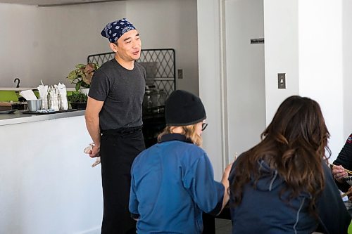 MIKAELA MACKENZIE / WINNIPEG FREE PRESS

Zhehong Wen, who just opened Poke Mono last week, speaks to a group of postal workers in for lunch in his restaurant in downtown Winnipeg on Thursday, March 19, 2020. For Ben Waldman story.
Winnipeg Free Press 2020