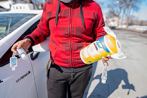 Mike Sudoma / Winnipeg Free Press
Taxi Driver, Hemant Dhir usefully stocked up on cleaning goods to keep his cab clean for customers
March 19, 2020