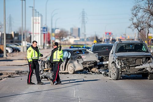 MIKAELA MACKENZIE / WINNIPEG FREE PRESS

Police on the scene of a motor vehicle collision on Regent Avenue at Straight Drive in Winnipeg on Friday, March 20, 2020. 
Winnipeg Free Press 2020