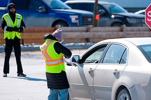 Daniel Crump / Winnipeg Free Press.¤A new community screening drive-thru opens in south Winnipeg at Manitoba Public Insurance Bison Drive Service Centre MPI. Employees vacated the premises earlier this week to make way for the testing facility. March 21, 2020.