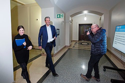 MIKE DEAL / WINNIPEG FREE PRESS
Premier Brian Pallister arrives at room 68 in the Manitoba Legislative building, Monday afternoon,  for a press conferencehe is hold with, Jerin Valel, Director of technology and transformation, priorities and planning secretariat, to talk about COVID-19 measures the province is taking.
200323 - Monday, March 23, 2020.