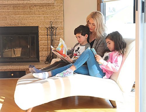 RUTH BONNEVILLE  /  WINNIPEG FREE PRESS 

Local - Satellite Schooling 

Catherine DeMarco reads at home with her son, Cristiano and daughter Gia, on Monday.

See Maggie Macintosh's story. 



March 23rd,, 2020
