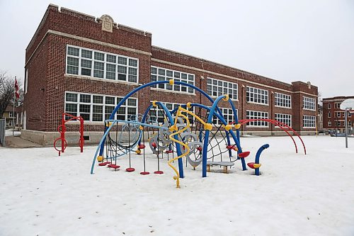 MIKE DEAL / WINNIPEG FREE PRESS

The empty playground at Mulvey School Tuesday morning. 
The Manitoba School Boards Association has recommended all provincial schools close their play structures on school grounds immediately to adhere to social distancing guidelines. MSBA said the use of such equipment is "prohibited" indefinitely, although it encourages families to play in open spaces near community and school playgrounds. The Winnipeg School Division is currently in the process of putting up signage and removing swings in all of its 89 school playgrounds.
200324 - Tuesday, March 24, 2020