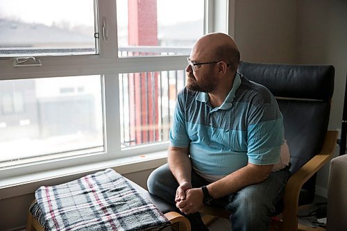 MIKAELA MACKENZIE / WINNIPEG FREE PRESS

Al Small, who has experience living in isolation as a person with a compromised immune system, poses for a portrait in his condo in Winnipeg on Tuesday, March 24, 2020. For Al Small story.
Winnipeg Free Press 2020