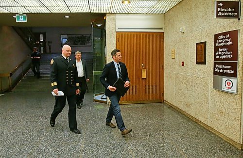 MIKE DEAL / WINNIPEG FREE PRESS
Mayor Brian Bowman and Jason Shaw, Manager, City of Winnipeg Emergency Operations Centre head to the City Hall Press Room to provide an update to the citys response to COVID-19 Tuesday afternoon. 
200324 - Tuesday, March 24, 2020