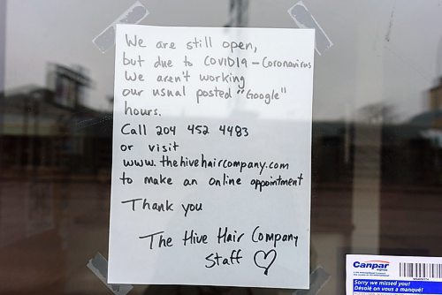 JESSE BOILY / WINNIPEG FREE PRESS
The Hive Hair Company, a hair salon, displays a sign of their closure due the COVID-19 outbreak on Monday, March 24, 2020.
Reporter: