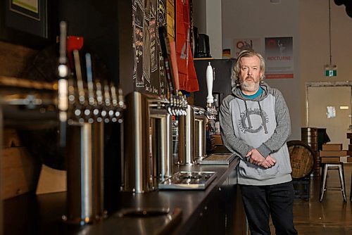 JESSE BOILY / WINNIPEG FREE PRESS
Paul Clerkin, an owner of Stone Angel Brewing Co., sits inside his brewery and tap house on Wednesday, March 25, 2020. Clerkin has closed their dining room and are only open for retail sales of their beer. He said that on a normal Wednesday afternoon the bar would be lined with patrons.
Reporter: Ben Sigurdson