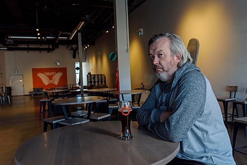 JESSE BOILY / WINNIPEG FREE PRESS
Paul Clerkin, an owner of Stone Angel Brewing Co., sits inside his brewery and tap house on Wednesday, March 25, 2020. Clerkin has closed their dining room and are only open for retail sales of their beer. He said that on a normal Wednesday afternoon the bar would be lined with patrons.
Reporter: Ben Sigurdson