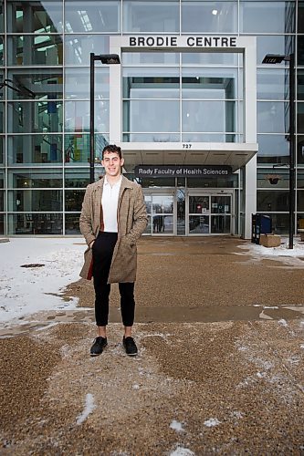 MIKE DEAL / WINNIPEG FREE PRESS
Second-year med student Juan Mohadeb, stands outside the Brodie Centre at the HSC. He was supposed to be relaxing during spring break. Then COVID 19 broke out. The trip was canceled. And healong with hundreds of other students in the health care fieldwere put to work as volunteers.
Hes at the testing centres screening people for entry and at the HSC explaining to visitors why they cant visit. 
200326 - Thursday, March 26, 2020.
See Ben Waldman saturday feature