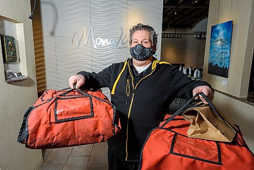 JESSE BOILY / WINNIPEG FREE PRESS
Joe Grande, owner of Mona Lisa restaurant, has now begun delivering pizzas for his business due to the slow down in business on Thursday, March 26, 2020.
Reporter: Doug Speirs