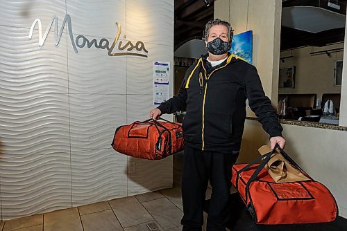 JESSE BOILY / WINNIPEG FREE PRESS
Joe Grande, owner of Mona Lisa restaurant, has now begun delivering pizzas for his business due to the slow down in business on Thursday, March 26, 2020.
Reporter: Doug Speirs