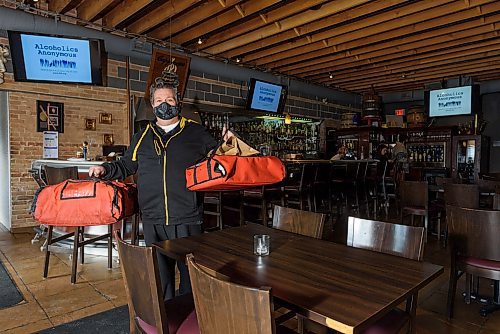 JESSE BOILY / WINNIPEG FREE PRESS
Joe Grande, owner of Mona Lisa restaurant, has now begun delivering pizzas for his business due to the slow down in business on Thursday, March 26, 2020.
Reporter: Doug Speirs