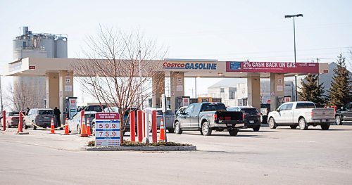 Mike Sudoma / Winnipeg Free Press
Drivers line up as gas prices at Costco Gas Bars go to an all-time low price of 59.9 Thursday afternoon
March 26, 2020