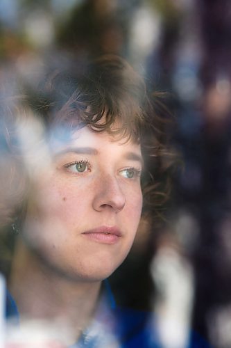 MIKAELA MACKENZIE / WINNIPEG FREE PRESS

Artist Natalie Baird poses in her window in Winnipeg on Thursday, March 26, 2020. 
Winnipeg Free Press 2020