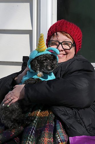 SHANNON VANRAES / WINNIPEG FREE PRESS
Barb Judt is the director of operations for the Animal Food Bank, a volunteer-based organization that provides pet food and other supplies to pet owners with little to no income. She was photographed at her Winnipeg home, with her dog Rocky, March 27, 2020.