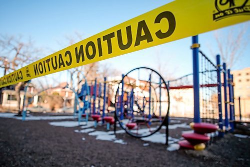 Daniel Crump / Winnipeg Free Press.The playground at Mulvey School in Wolseley is taped off. Effective Saturday, the city of Winnipeg shut down playgrounds, picnic shelters, and park amenities until further notices. March 28, 2020.