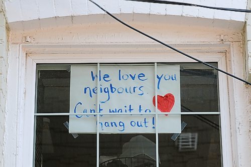 Daniel Crump / Winnipeg Free Press. The Gonzalez family has yet to meet their neighbours who just moved to Canada from Sweden and are still under mandatory quarantine. To welcome them the Gonzalezes decided to put this sign in a window which faces their neighbours new house. March 28, 2020.