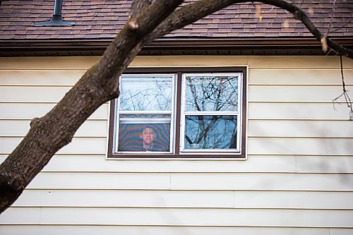 MIKAELA MACKENZIE / WINNIPEG FREE PRESS

Freelance illustrator, designer and cartoonist Jonathan Dyck poses for a portrait in his Wolseley apartment window in Winnipeg on Monday, March 30, 2020. 
Winnipeg Free Press 2020