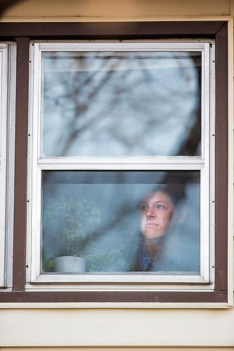 MIKAELA MACKENZIE / WINNIPEG FREE PRESS

Freelance illustrator, designer and cartoonist Jonathan Dyck poses for a portrait in his Wolseley apartment window in Winnipeg on Monday, March 30, 2020. 
Winnipeg Free Press 2020