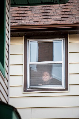 MIKAELA MACKENZIE / WINNIPEG FREE PRESS

Freelance illustrator, designer and cartoonist Jonathan Dyck poses for a portrait in his Wolseley apartment window in Winnipeg on Monday, March 30, 2020. 
Winnipeg Free Press 2020