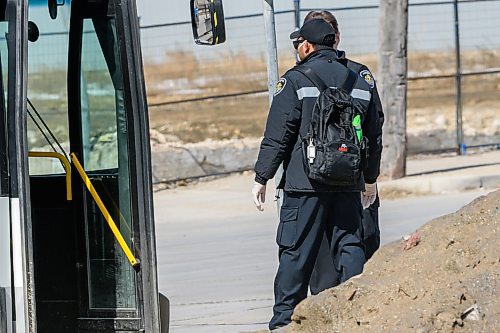 JESSE BOILY / WINNIPEG FREE PRESS
A transit workers backpack holds hand sanitizer and a cleaning product on Monday, March 30, 2020. Many riders are trying to keep their distance between each other as social distancing is practiced during the current pandemic. 
Reporter: Eva Wasney