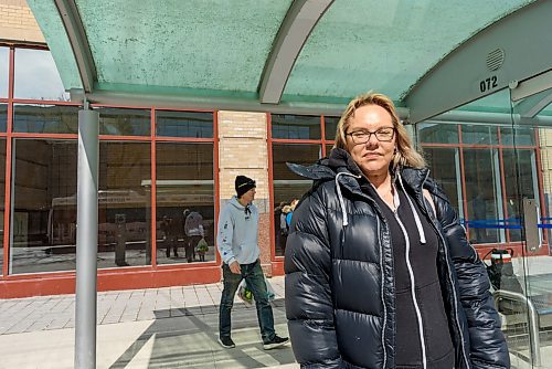 JESSE BOILY / WINNIPEG FREE PRESS
Kelly Rheaume, a transit rider, waits for the bus at a Portage Ave bus stop on Monday, March 30, 2020. Many riders are trying to keep their distance between each other as social distancing is practiced during the current pandemic. 
Reporter: Eva Wasney