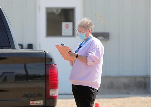 RUTH BONNEVILLE  /  WINNIPEG FREE PRESS 

Local -  Selkirk 
COVID-19 Drive-thru testing site

Drive-thru Coronavirus testing site in Selkirk, Manitoba.  

March 30th, 2020
