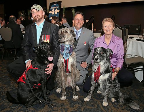 JASON HALSTEAD / WINNIPEG FREE PRESS

From left, attendees from K9RR Service Dogs Scott Stroh (with Sasha), Chris Semchuck (with Aoiefe) and Kelly Russell (K9RR head trainer and owner, with Spot) at the seventh annual Ball for the Brave in support of Cvet's Pets Helping Vets at the Metropolitan Entertainment Centre on March 5, 2020. (See Social Page)