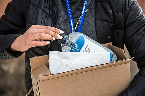 MIKAELA MACKENZIE / WINNIPEG FREE PRESS

Saranjit Dhaliwal, Misercordia staff, shows the hand sanitizer and N95 masks she bought at Showcase at Polo Park mall in Winnipeg on Wednesday, April 1, 2020. For Eva Wasney story.
Winnipeg Free Press 2020