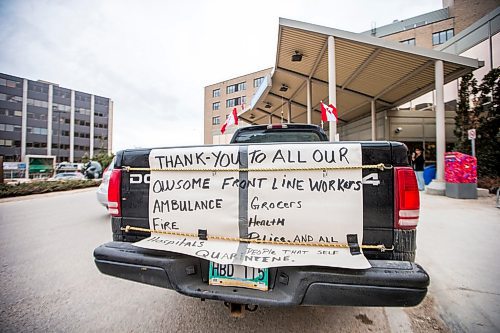 MIKAELA MACKENZIE / WINNIPEG FREE PRESS

A sign on the tailgate of a truck at the St. Boniface Hospital thanks front-line workers for their services in Winnipeg on Wednesday, April 1, 2020. 
Winnipeg Free Press 2020