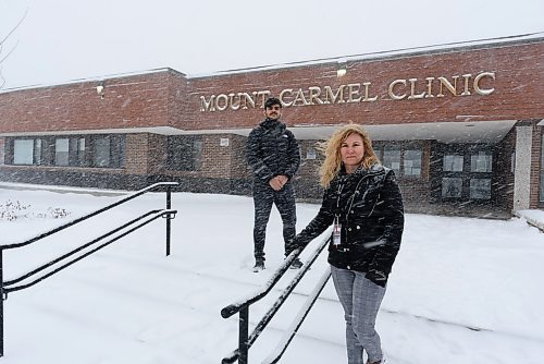 JESSE BOILY / WINNIPEG FREE PRESS
Fenil Vekaria, left, and Sherri Derksen are volunteer greeters at the Mount Carmel Clinic stop for a picture on Thursday, April 2, 2020. They help screen people before getting tested for COVID-19 tests.
Reporter: Aaron Epp