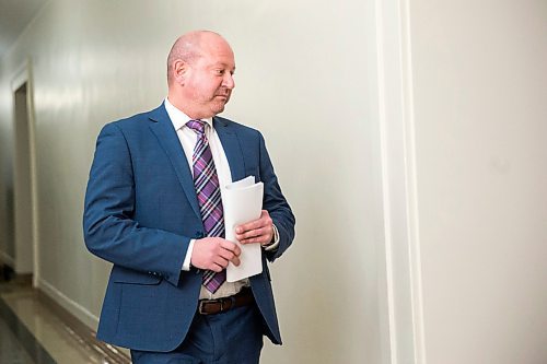 MIKAELA MACKENZIE / WINNIPEG FREE PRESS

Chief public health officer Dr. Brent Roussin walks into room 68 to provide his daily media briefing at the Manitoba Legislative Building in Winnipeg on Monday, April 6, 2020. 
Winnipeg Free Press 2020