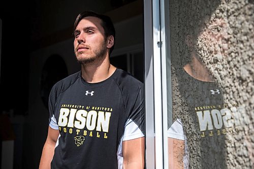 MIKAELA MACKENZIE / WINNIPEG FREE PRESS

Bisons player Derek Dufault, who is ready for his CFL career to start in Hamilton but will have to wait because of the pandemic, poses for a portrait at his home in Winnipeg on Monday, April 6, 2020. 
Winnipeg Free Press 2020
