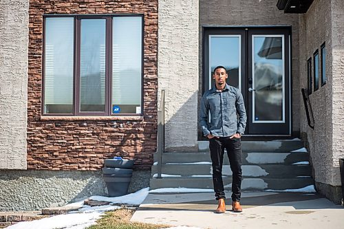 MIKAELA MACKENZIE / WINNIPEG FREE PRESS

Former U of M basketball player and med school grad Amir Ali, who is moving to Toronto to become a ER resident on the front line of the COVID-19 fight, poses for a portrait in front of his house in Winnipeg on Monday, April 6, 2020. 
Winnipeg Free Press 2020