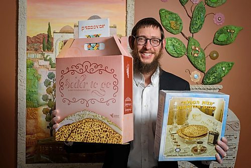 JESSE BOILY  / WINNIPEG FREE PRESS
Rabbi Boruch Heidingsfeld poses with the seder kits at Chabud- Lubavitch of Winnipeg on Monday. Monday, April 6, 2020. Due to the COVID-19 pandemic passover is being adapted so many are using the seder kits for at home meals this year.
Reporter: Brenda Suderman